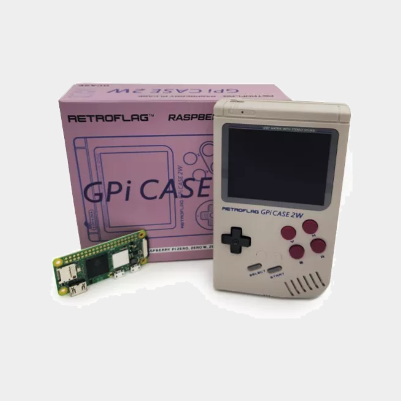 Un GPi Case 2W posé devant son emballage et un Raspberry Pi Zero 2W sur sa gauche